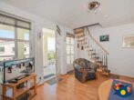 Villa Margot Whg. 19 - Wohnbereich mit Couch und TV