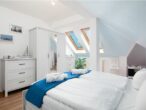 Villa Malve Whg. 10 /- - Schlafzimmer mit Doppelbett und Kuschelecke für die Kleinen