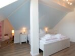 Villa Malve Whg. 10 /- - Schlafzimmer mit Doppelbett und Kuschelecke für die Kleinen