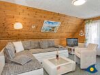 Haus Ückeritz Loggiawohnung - Wohnzimmer mit Zugang zum Balkon