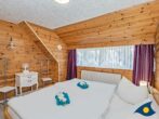 Haus Ückeritz Loggiawohnung - Schlafzimmer mit Doppelbett