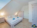 Haus Seemannsgarn - Schlafzimmer 2 mit Doppel- und Kinderbett im 1.OG