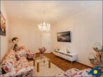 Villa Ute Whg. Vanessa - Wohnbereich  mit Couch und TV