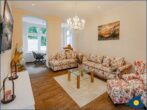 Villa Ute Whg. Vanessa - Wohnbereich  mit Couch und TV