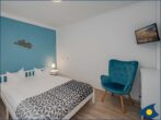 Strandsegler EG // - Schlafbereich mit Doppelbett und TV