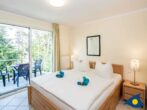 Villa Strandperle, Whg. 24 // - Schlafzimmer mit Zugang zum Balkon