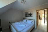 Ferienwohnung Mühlenidyll - separates Schlafzimmer mit Doppelbett