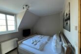 Ferienwohnung Mühlenidyll - separates Schlafzimmer mit Doppelbett