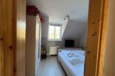 Ferienwohnung Mühlenidyll - separates Schlafzimmer mit Doppelbett