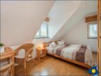 Doppelhaus Trassenheide 02 - Schlafzimmer 1 mit Doppelbett