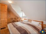 Doppelhaus Trassenheide 02 - Schlafzimmer 1 mit Doppelbett
