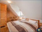 Ferienhaus Paula - Schlafzimmer 1 mit Doppelbett