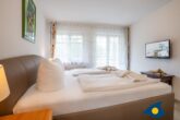Ostseepark 12 Whg. 02 //- - Schlafzimmer mit Doppelbett