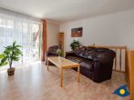 Haus Möwe Whg. 04 - Wohnbereich mit Couch und TV