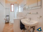 Villa an der Post Whg. 02 - Badezimmer mit Doppelbett