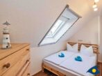 Ferienhaus Melle 01 - 2 . Schlafzimmer mit einem Doppelbett