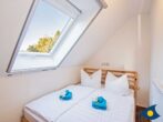 Ferienhaus Melle 01 - 2 . Schlafzimmer mit einem Doppelbett