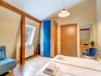 Ferienwohnung Achterhuus - Schlafzimmer mit Doppelbett