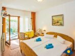 Dünenhaus Whg. 02 - - Wohn- und Schlafbereich mit Zugang zur Terrasse