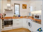 Haus Hornhecht - offene Küche mit Waschmaschine