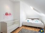 Villa Maria-Gabriele Whg. 13 - Schlafzimmer 2 mit Doppelbett, Tandembett für 2 Kinder und Kinderbett
