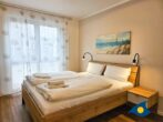 Bernsteinquartier Whg. 11 Inselglück - Schlafzimmer 1 mit TV