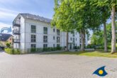 Bernsteinquartier Whg. 11 Inselglück - Außenansicht Bernsteinquartier mit Parkplatz Nr. 11