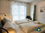 Bernsteinquartier Whg. 11 Inselglück - Schlafzimmer 2 mit TV und Zugang zu einem Bad