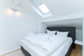 Villa Livia Whg. 04 /- - Schlafzimmer 1 mit Doppelbett