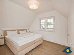 Fischerdorf Käptns Ferienhaus - Schlafzimmer mit Doppelbett