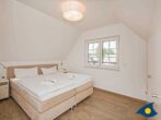 Fischerdorf Käptns Ferienhaus - Schlafzimmer mit Doppelbett