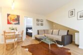 Villa Livia Whg. 05 /- - Wohnzimmer mit Essbereich