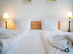 Haus Meeresrauschen Whg. 07 - Schlafzimmer mit begehbaren Kleiderschrank