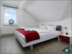 Villa Malve Whg. 11 - Schlafzimmer 1 mit Doppelbett