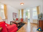 Villa Sonnenschein Whg. 03 /- - Wohnzimmer mit Zugang zur Terrasse