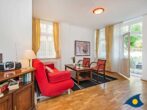 Villa Sonnenschein Whg. 03 /- - Wohnzimmer mit Zugang zur Terrasse