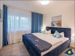 Dünenhaus Christa Whg. 03 - Schlafzimmer mit Doppelbett