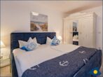 Dünenhaus Christa Whg. 03 - Schlafzimmer mit Doppelbett