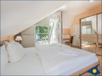 Villa Strandperle, Whg. 33 // - Schlafzimmer mit Doppelbett