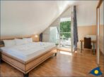 Villa Strandperle, Whg. 33 // - Schlafzimmer mit Doppelbett