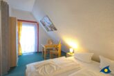 Kirchstraße Whg. 01 /- - Schlafzimmer mit Zugang zum Balkon