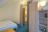 Kirchstraße Whg. 01 /- - Schlafzimmer mit Zugang zum Balkon