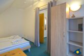 Kirchstraße Whg. 01 /- - Schlafbereich mit Zugang zum Balkon