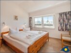 Haus Perle Whg. 01 - Schlafzimmer mit Doppelbett