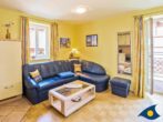 Stadtresidenz Whg. 04 - Wohnzimmer mit Zugang zum Balkon