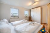 Apartmenthaus Baltic Five - Whg. 5 - Schlafzimmer mit Doppelbett