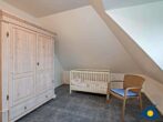 Haus Klabautermann - Schlafzimmer 2 mit Doppel- und Kinderbett im 1.OG