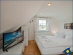 Strandsegler DG // - Schlafbereich mit Doppelbett und TV