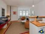 Villa Vineta Whg. 14 - Wohnbereich mit Couch und TV