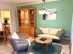 Villa Margot Whg. 08 - Wohnzimmer mit Zugang zum Balkon